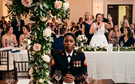 My sister publicly mocked my military service at her wedding while I sat at the fire exit table. Then her groom stood, saluted me, and called me ma'am in front of a hundred guests.