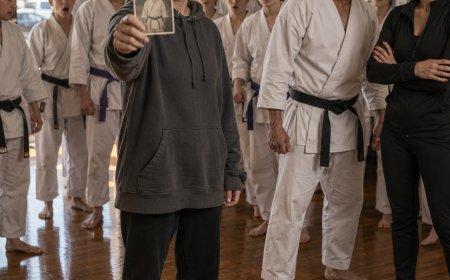 My dojo laughed at me for showing up in a faded hoodie and worn sneakers. Then I held up a creased photo, and every single student went still.