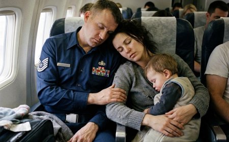 My 14-month-old daughter was asleep on my chest when a decorated Army officer leaned over and whispered, “Pretend you’re my wife.” I thought he was crazy until a photo from that flight tied our lives together forever.