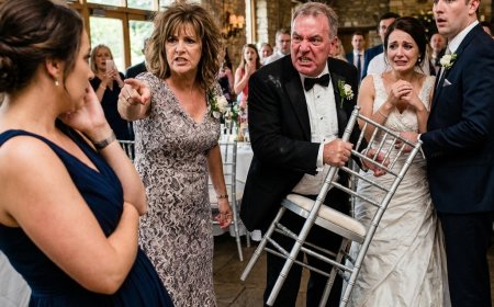My father grabbed a heavy metal cake stand at my sister’s wedding and threatened me in front of 175 guests because I refused to sign over the house I built with my own hands. Then her new husband opened his phone and the room went completely silent.